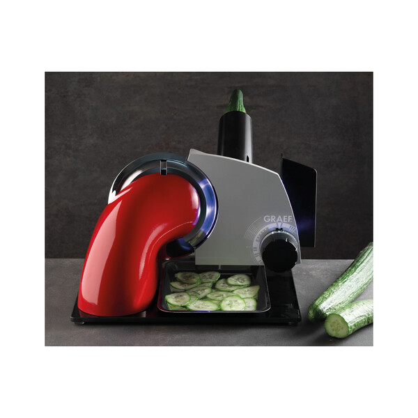 Küchengerät, Slicer, grüne Gemüsescheiben, Gurkenscheiben, roter Kabelsalat/roter Bogen